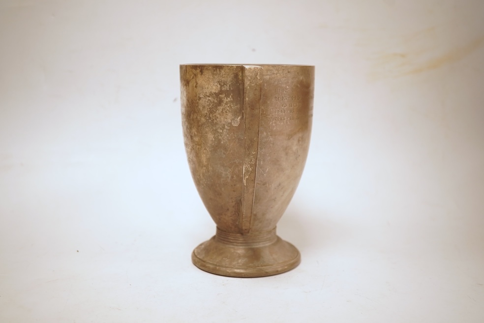 An Art Deco silver two handled presentation trophy cup, with engraved inscription, Adie Bros. Birmingham, 1928, height 17.4cm, 21oz.